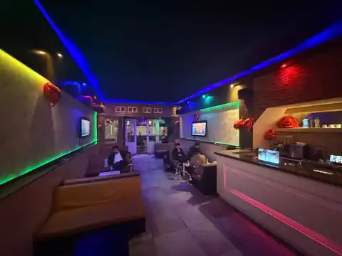 Shisha Lounge Angelo interior with neon lighting and lounge seating