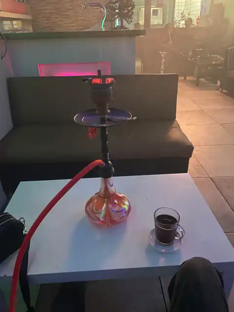 Shisha and drinks on table at Angelo Lounge